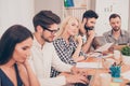 Photo of beautiful happy girl sitting at conference table and dreaming of vacation