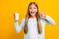 Photo of beautiful little blond lady model hold arm raise thumb finger advising drink milk every morning to be healthy Royalty Free Stock Photo