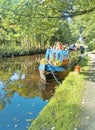 Narrow boat canal river scene rural countryside country water trees boats boating holiday vacation english riviera Royalty Free Stock Photo