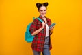 Photo of beautiful student lady hold telephone combine freelance work and study blue rucksack on shoulder wear casual Royalty Free Stock Photo