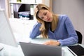 Businesswoman Sleeping In Office