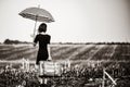 Young woman with suitcase and umbrella Royalty Free Stock Photo