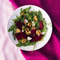 Elegant and Nutritious Arugula and Beet Salad with Toasted Walnuts and Sherry Vinaigrette