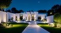 Ai generated a beautifully illuminated white mansion at nighttime Royalty Free Stock Photo