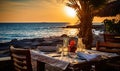 Photo of a beautifully set table for two with a stunning ocean view Royalty Free Stock Photo