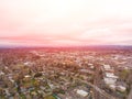 A photo of Beaverton, Oregon, USA, at sunset, a suburb. A photo from a height at sunset or sunrise. Design background