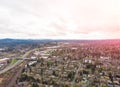 A photo of Beaverton, Oregon, USA, at sunset, a suburb. A photo from a height at sunset or sunrise. Design background