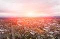 A photo of Beaverton, Oregon, USA, at sunset, a suburb. A photo from a height at sunset or sunrise. Design background