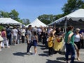 Big Crowd of People at the Greek Festival in May Spring