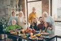 Photo of big family standing hugging feast table holiday roasted beef turkey making portrait eight members relatives