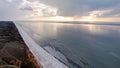 Photo from a bird`s eye view. Landscape of canyons and the sea shot from a drone