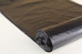 Black bin liner rolled out Royalty Free Stock Photo