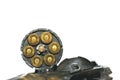 Photo of black revolver gun with cartridges isolated on white background Royalty Free Stock Photo