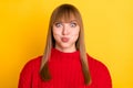 Photo of blond nice optimistic lady hold air wear red sweater isolated on bright yellow color background