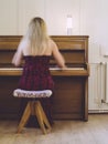 Woman with motion blur playing the piano