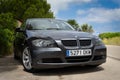 JULY 2018: BMW 3 series E90 330i Sparkling Graphite at the mountain road. Royalty Free Stock Photo