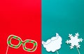 Photo booth colorful props for christmas party - beard, glasses on sticks on green red background. Christmas and New year Royalty Free Stock Photo