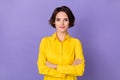 Photo of boss young bob hairdo lady crossed arms wear yellow blouse isolated on violet color background