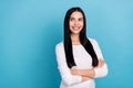 Photo of boss young brunette lady crossed arms look promo wear white shirt isolated on blue color background