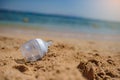 Photo of a bottle for milk on the sand on the beach Royalty Free Stock Photo