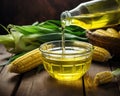 photo of a bottle of virgin extra corn oil pouring into a glass.