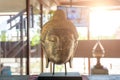 Photo of bronze buddha head in museum