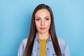 Photo of brunette boss young lady wear jeans shirt isolated on blue color background