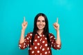 Photo of brunette woman pointing her fingers up useful information apply new vacancy instagram direct isolated on blue