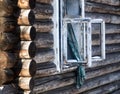 Photo of a burnt house in winter. Charred beams of a wooden house. Burned down house