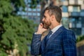 photo of businessman call on phone and talk, advertisement. businessman