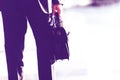 Cropped image of businessman holding briefcase bag in airport Royalty Free Stock Photo