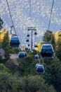 Photo of cable car cabins in mountain area