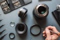 Photo camera lens repair set. Engineer maintenance Royalty Free Stock Photo
