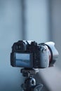 Photo camera mounted on a tripod close-up Royalty Free Stock Photo