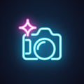 Photo camera neon icon isolated on black background. Interface pictogram for games, sites and mobile apps. Vector