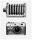 Photo camera vintage, engraved hand drawn in sketch or wood cut style, old looking retro lens, isolated vector realistic Royalty Free Stock Photo