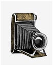 Photo camera vintage, engraved hand drawn in sketch or wood cut style, old looking retro lens, isolated vector realistic Royalty Free Stock Photo