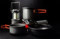 Photo of camping dishes with lantern and stove