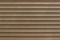 Beautiful brown plastic window blind. Horizontal lines