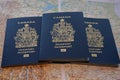 Photo of a Canadian passports against map Royalty Free Stock Photo