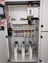 Photo of capacitor bank connection in electrical cabinet. Royalty Free Stock Photo