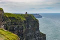 Photo capture of a breathtaking natural nature landscape. Cliffs of moher with O`brien`s tower, wild atlantic way. Ireland. Euro Royalty Free Stock Photo