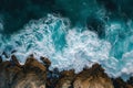 This photo captures an aerial view of the ocean and rocks, showcasing the natural beauty of the landscape, Striking aerial