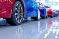 Brand New Wheels: A View of Diverse Car Models Parked in a Showroom Lot