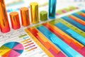 This photo captures a detailed close up of a brightly colored bar chart placed on a table, A diagram of typical investment