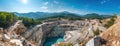 Aerial View of Vast Water-Filled Open-Pit Quarry