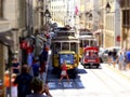 Lisbon's Dynamic Urban Scene with Yellow Tram Royalty Free Stock Photo