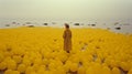 Person In Field Of Yellow Balloons: A Nautical Surrealist Movie Still In 8k Resolution