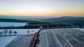 The photo captures a mesmerizing winter landscape as seen from the lofty vantage point of a drone