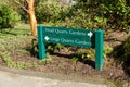 The photo captures the view of directional signs inside Queen Elizabeth Park